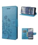 For Nokia G60 Butterfly Flower Pattern Leather Phone Case(Blue)