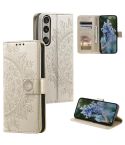 For Sony Xperia 1 VII Totem Flower Embossed Leather Phone Case with Lanyard(Gold)