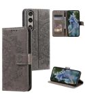 For Sony Xperia 1 VII Totem Flower Embossed Leather Phone Case with Lanyard(Grey)