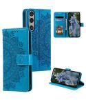 For Sony Xperia 1 VII Totem Flower Embossed Leather Phone Case with Lanyard(Blue)