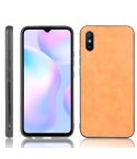 For Xiaomi Redmi 9A Shockproof Sewing Cow Pattern Skin PC + PU + TPU Case(Orange)