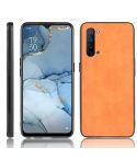 For OPPO K7 5G Shockproof Sewing Cow Pattern Skin PC + PU + TPU Case(Orange)