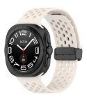 For Samsung Galaxy Watch Ultra 47mm Hole Style Magnetic Folding Buckle Silicone Watch Band(Starlight)