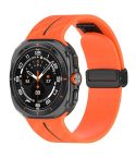 For Samsung Galaxy Watch Ultra 47mm Carbon Fiber Magnetic Folding Buckle Silicone Watch Band(Orange Black)