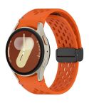 For Samsung Galaxy Watch 7 40 / 44mm Holes Style Stitched Folding Buckle Silicone Watch Band(Orange)