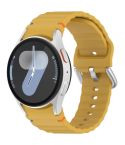For Samsung Galaxy Watch 7 40 / 44mm Wavy Grain Stitched Silver Buckle Silicone Watch Band(Yellow)