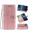 For Sony Xperia L4 Cute Cat and Dog Embossed Horizontal Flip Leather Case with Bracket / Card Slot / Wallet / Lanyard(Rose Gold)